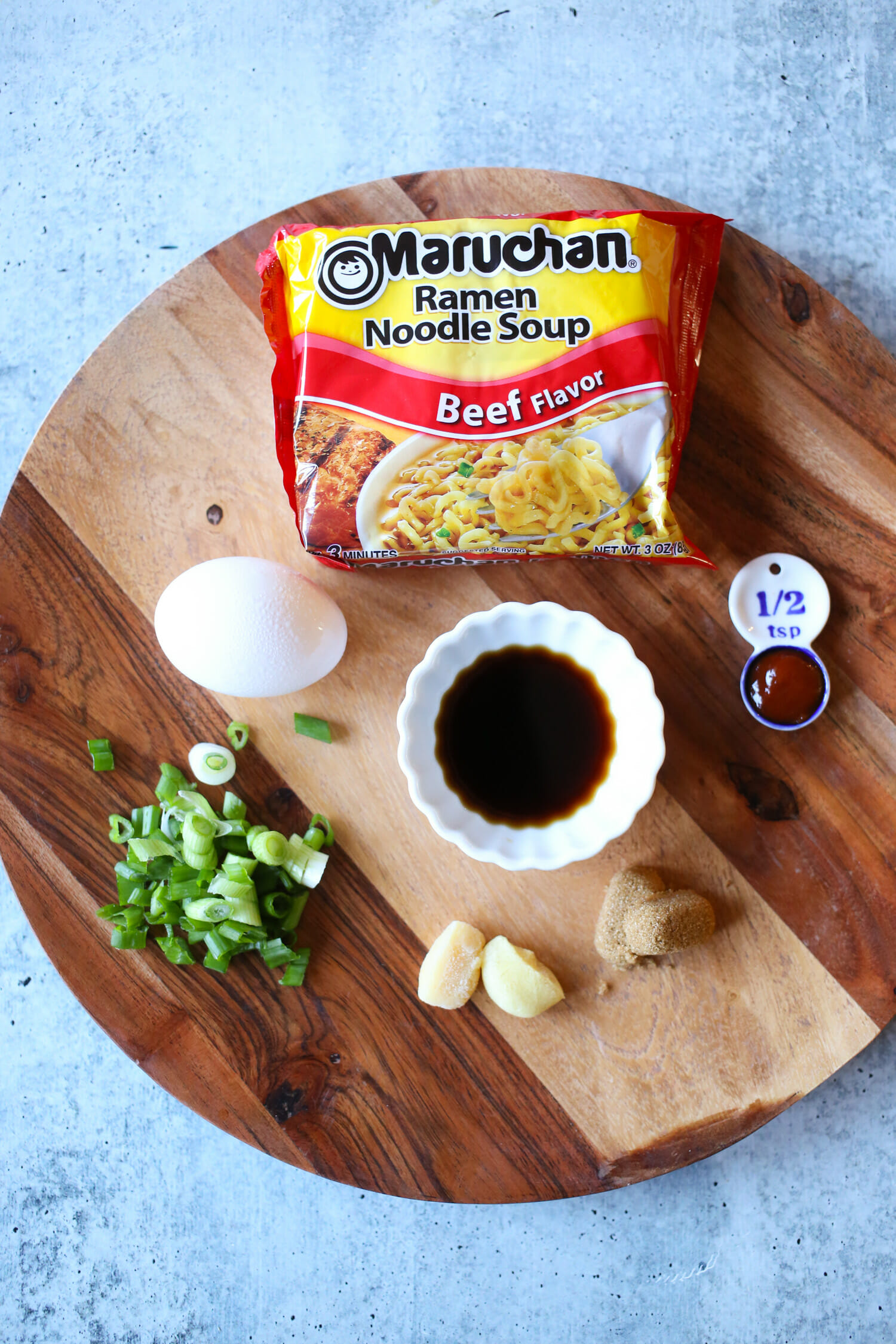 ingredients for TikTok ramen on a wood plate