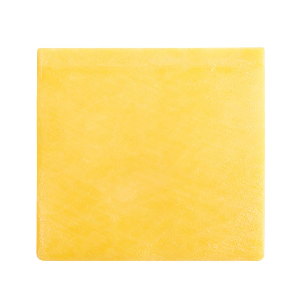 slice of cheese isolated on white background